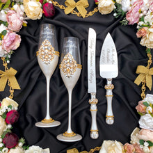 Load image into Gallery viewer, Ivory wedding glasses for bride and groom, cake knife and server, wedding plate, unity candles