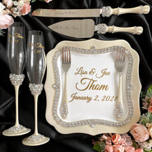 Load image into Gallery viewer, Ivory wedding flutes for bride and groom, wedding cake server sets, wedding cake plate