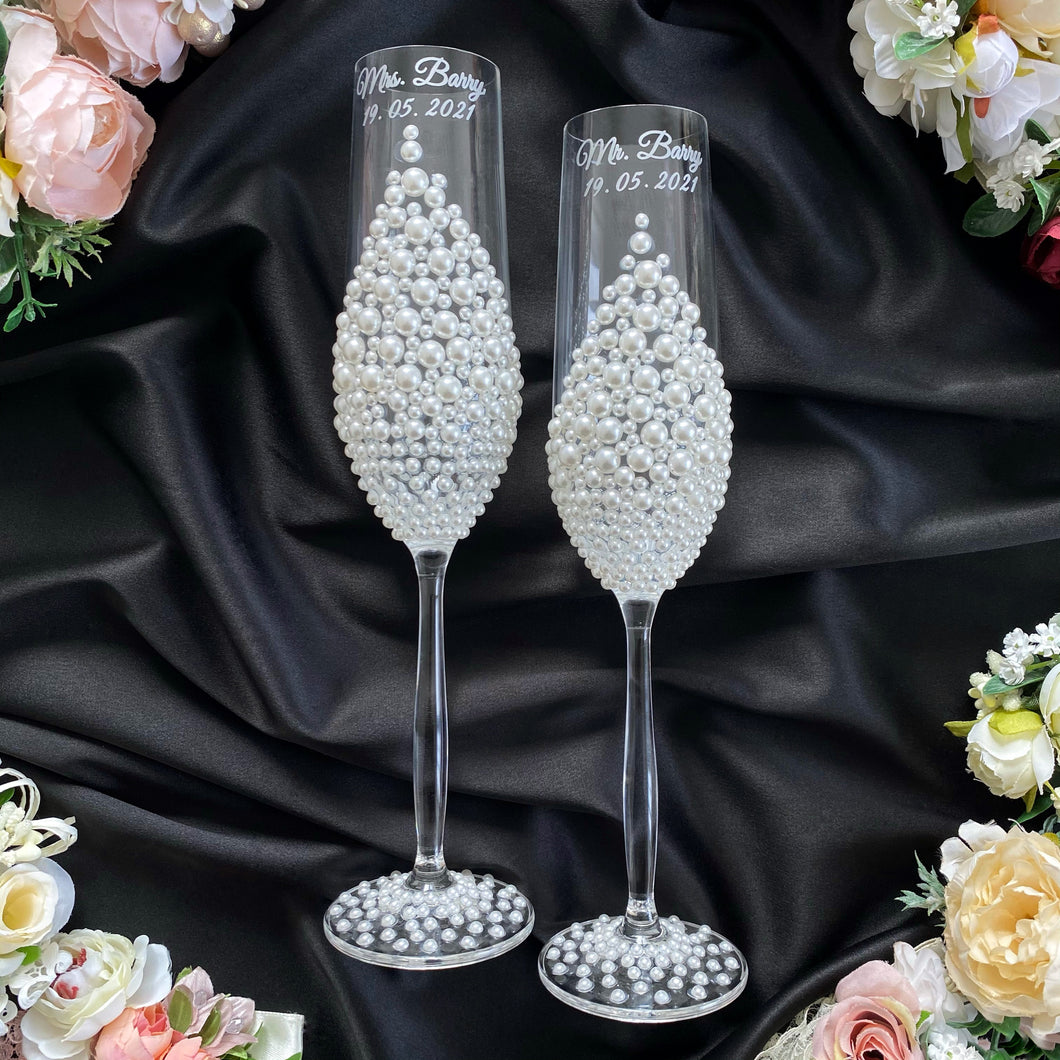 Powdery pearl wedding glasses for bride and groom