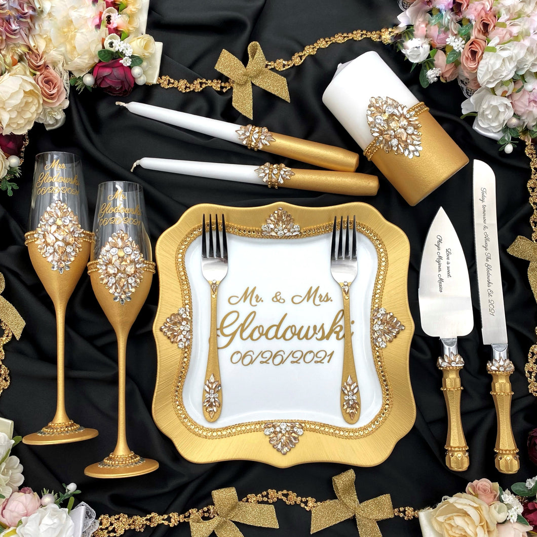 Gold wedding cake cutting set, wedding glasses for bride and groom, wedding plate and forks, unity candles