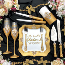 Load image into Gallery viewer, Gold wedding glasses for bride and groom, cake knife and server
