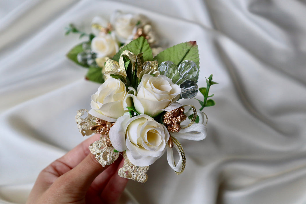 Flower wrist corsage, & wedding boutonnieres for bride and groom